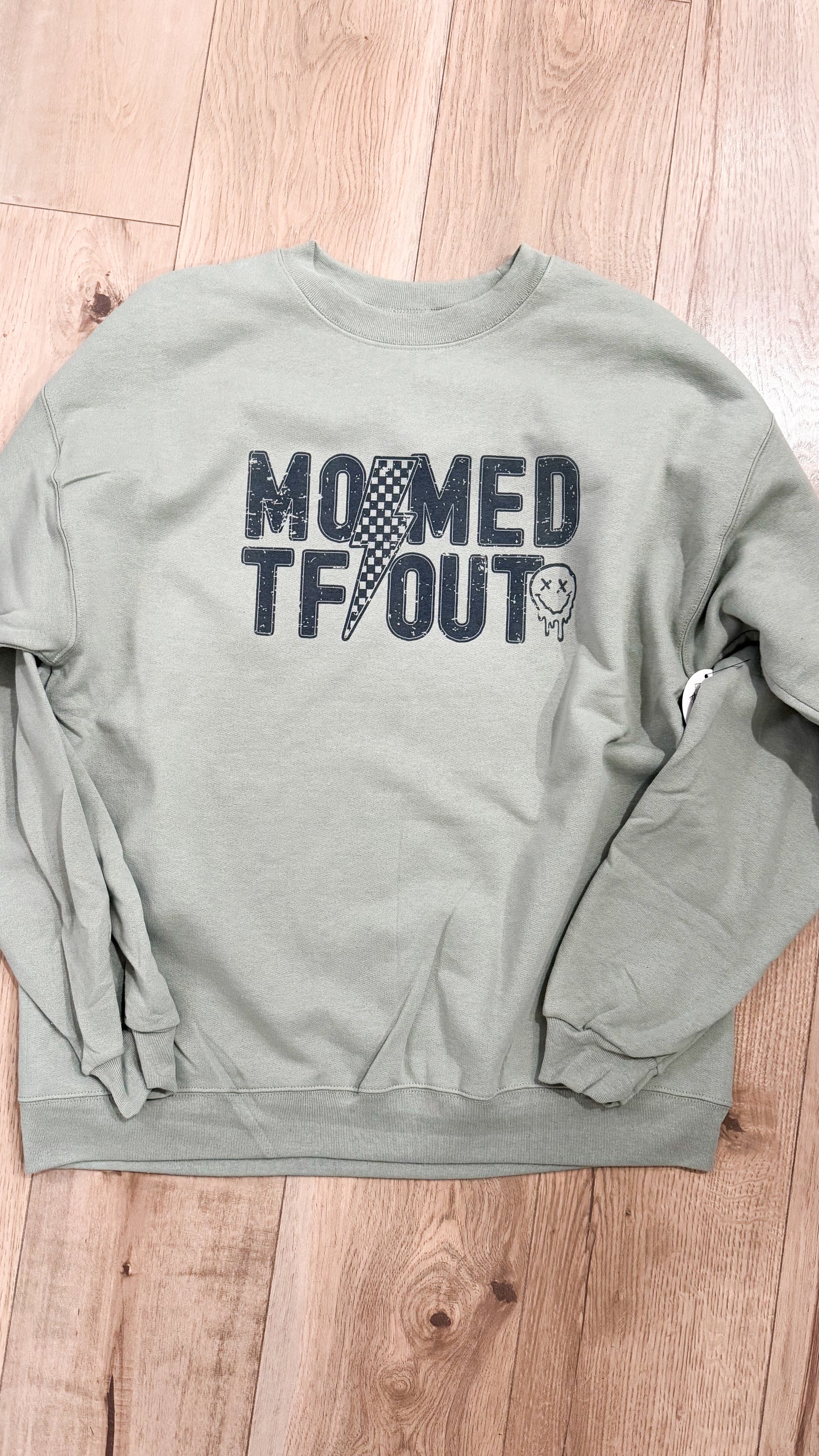Momed TF Out Graphic