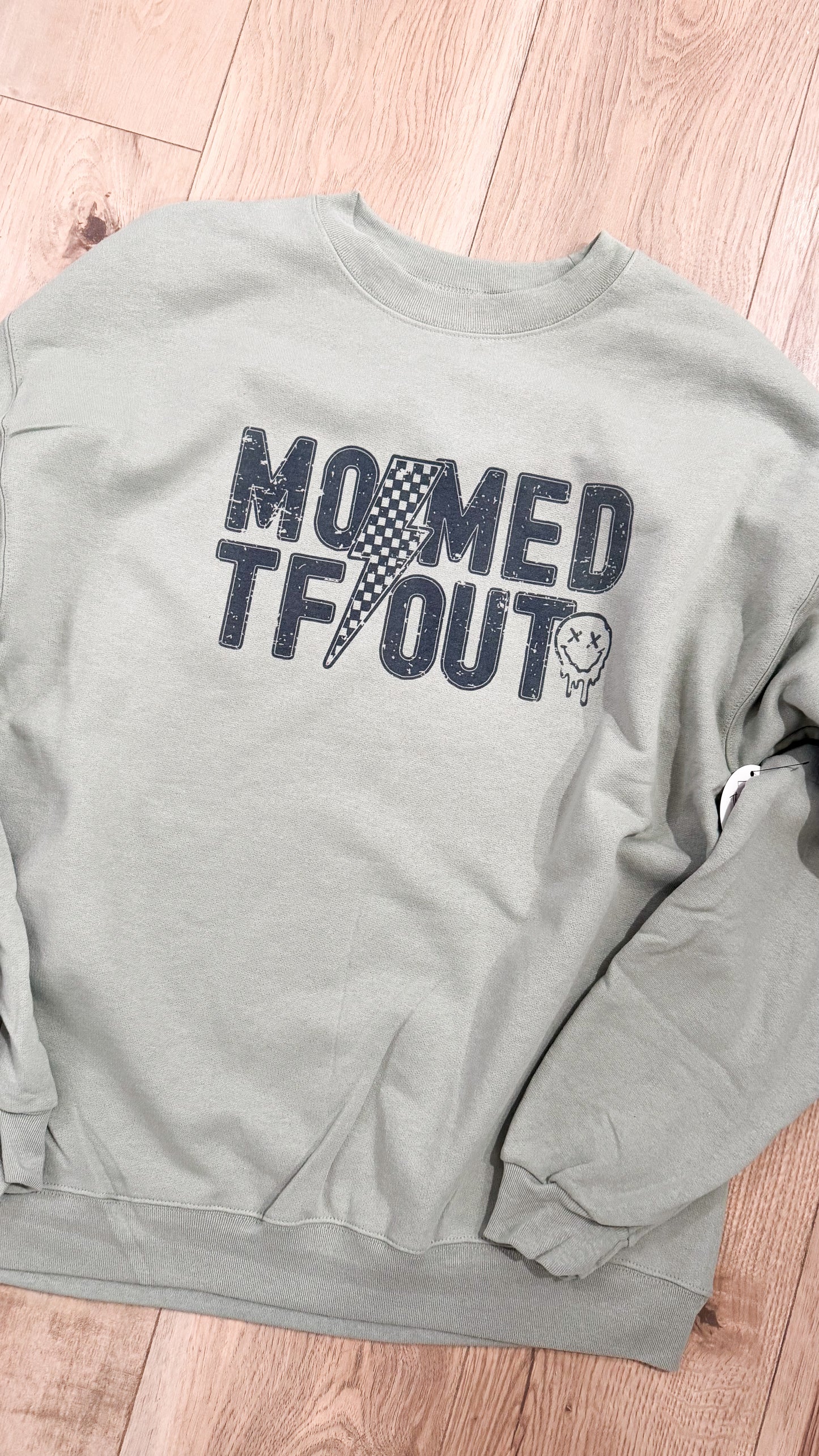 Momed TF Out Graphic